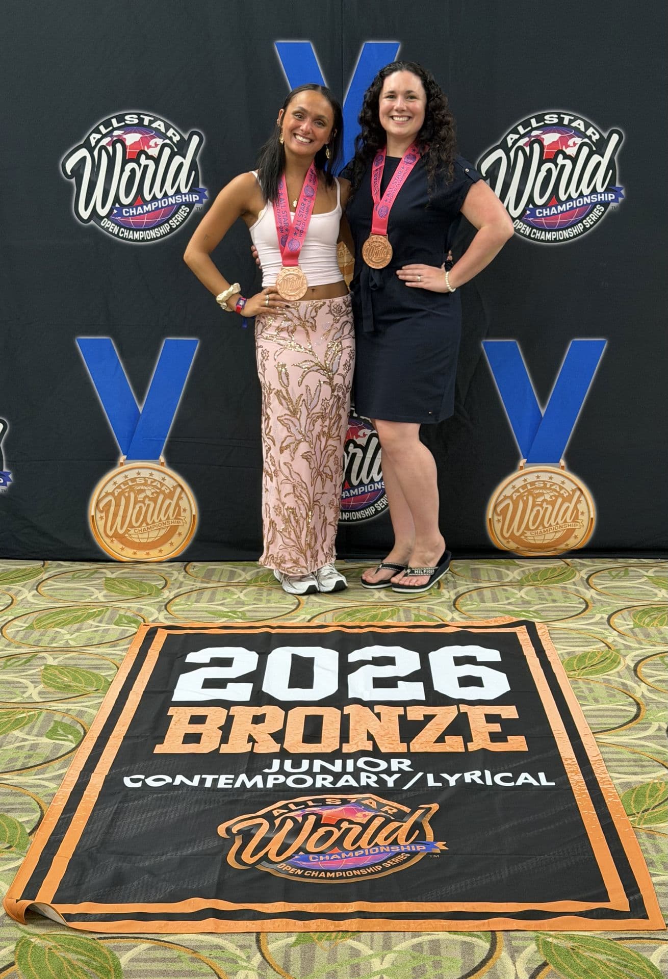 Dance in Motion Academy students with Allstar Worlds bronze medals