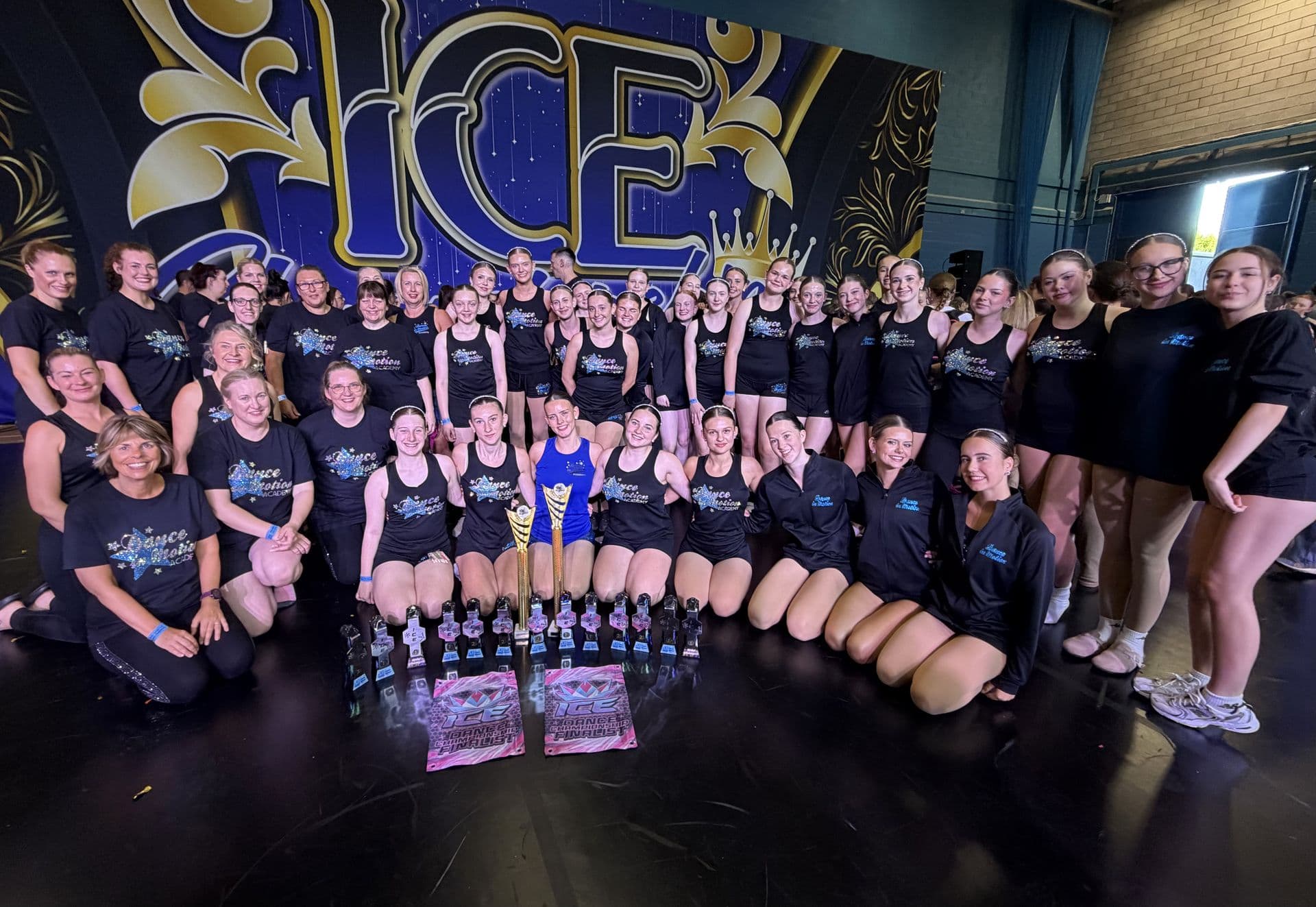 Competition team with ICE trophies