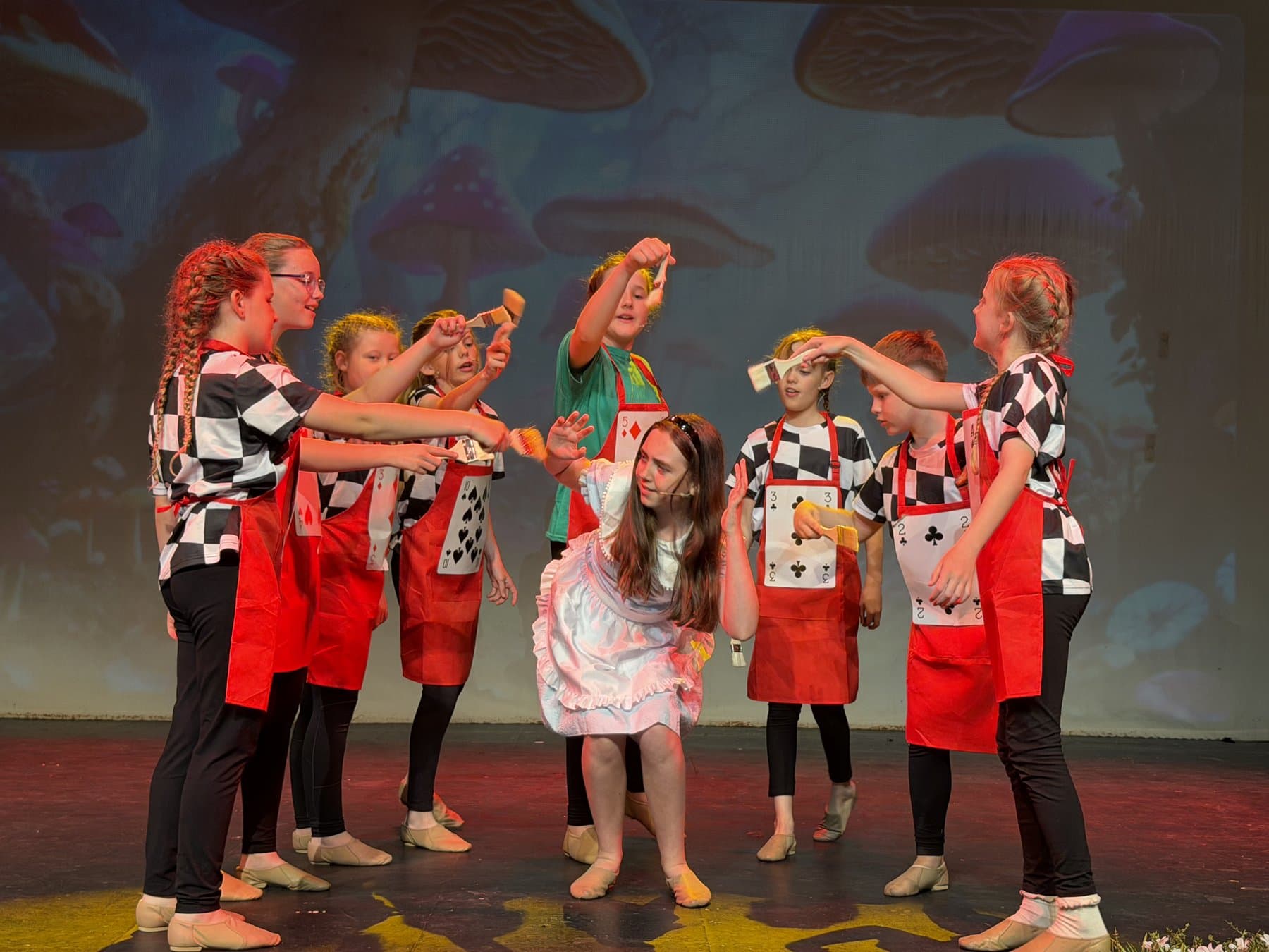 Sparkle Theatre Company Alice in Wonderland Jr, painting the roses red